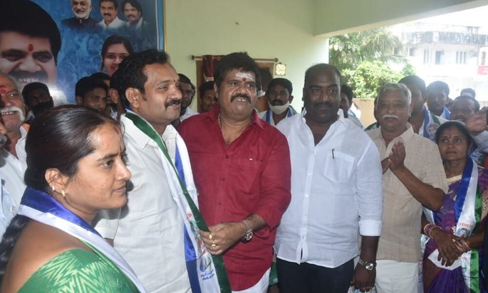 Tourism Minister M Srinivasa Rao welcoming TDP leaders who joined the YSRCP in Visakhapatnam on Tuesday